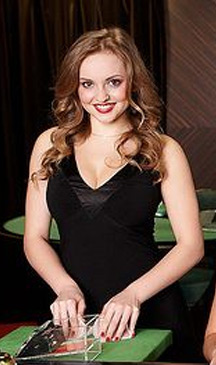 Eine Dealerin beim Live Baccarat im Live Dealer Bereich des Dunder Casinos.